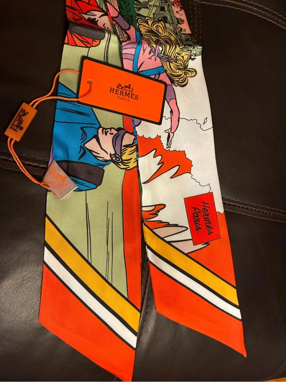 Hermes. “WOW “ Twilly Scarf 100% Silk Ladies Orange Multi Color NWT